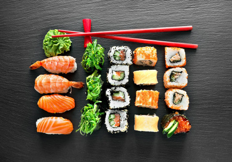 Who Invented the Sushi: Pioneering Minds Behind Sushi Evolution